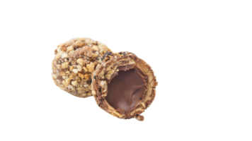 Rich chocolate truffles with a crunchy nut coating and soft chocolate center isolated on transparent background png