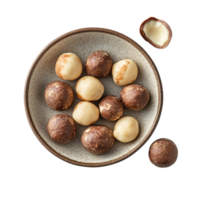 A plate of fresh macadamia nuts on a transparent background ready for snacking or baking, macadamia nuts in plate on transparent background png
