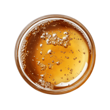 Malt extract in a clear jar on a transparent background capturing its bubbly texture and rich amber color, malt extract on transparent background png