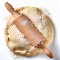 Homemade Dough Preparation Rolling Pin on Fresh Dough for Baking photo