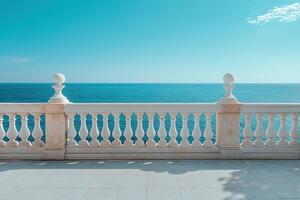 Ocean view from empty spacious terrace with white marble railings. Serene atmosphere ideal for relaxation and contemplation. photo