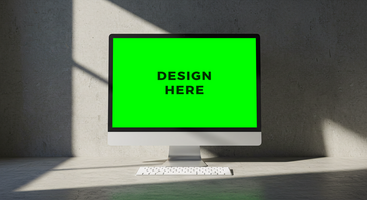 Computer monitor mockup with green screen displayed on textured concrete surface for design placement psd