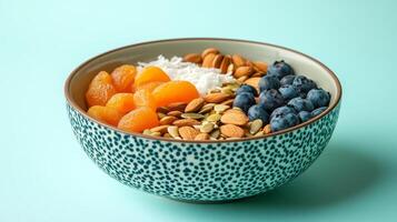 Nutritious and Colorful Breakfast Bowl with Dried Fruit, Nuts, and Berries photo