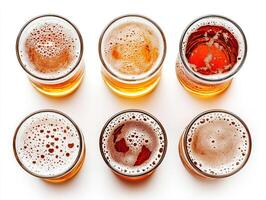 Different varieties of craft beer arranged on a white surface photo