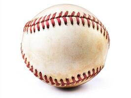 Baseball resting on a smooth surface showcasing its wear and texture photo