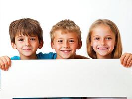 Children holding a blank sign and smiling happily together photo