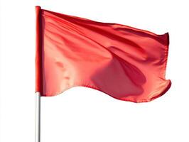 Bright red flag waving in the wind photo