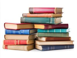 Stack of colorful vintage books arranged neatly on a surface photo