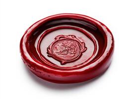 Wax seal showing intricate design on a flat surface photo
