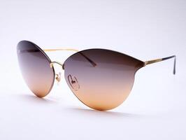 Stylish sunglasses with elegant cat-eye design and gradient lenses photo