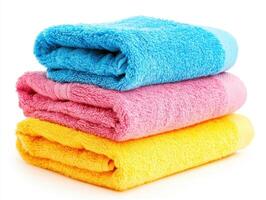 Colorful towels stacked neatly for a vibrant bathroom setting photo