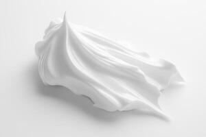 Whipped cream texture displayed on a smooth surface photo