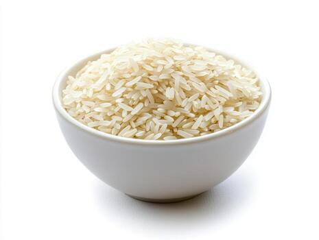 Fresh uncooked rice in a simple white bowl on a clean surface photo