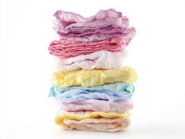 Colorful stack of baby diapers in a bright setting photo