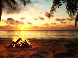 Sunset beach bonfire with palm trees and ocean waves photo