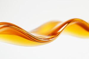Fluid amber waves dance on a smooth surface in soft light photo