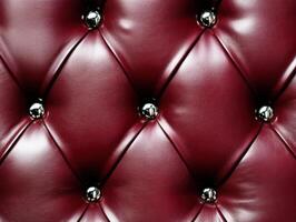Deep red leather tufted upholstery showcasing elegant design photo