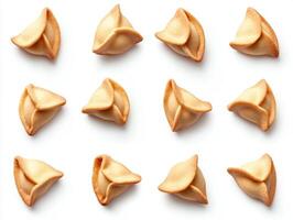 Fortune cookies arranged in a repeating pattern on a surface photo