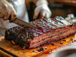 Masterful brisket being sliced in a barbecue setting photo