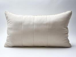 Decorative throw pillow in neutral color placed on a light background photo
