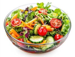 Fresh garden salad featuring colorful vegetables in a glass bowl photo