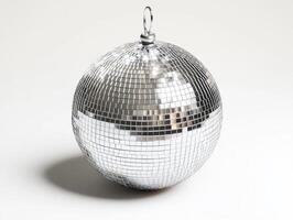 Disco ball reflecting light at an indoor event photo