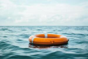 Lifebuoy floating in calm ocean waters on a sunny day photo
