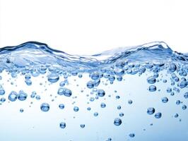 Bubbles rising in clear water under bright lighting conditions photo