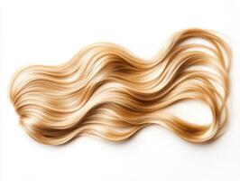 Wavy golden hair strands displayed on a white background photo