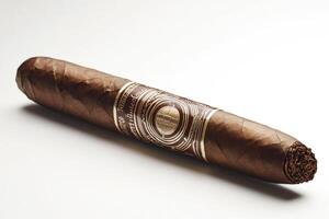 Quality hand-rolled cigar displayed on a plain background photo