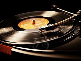 Vinyl record spinning on turntable in a dimly lit room photo
