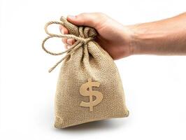 Hand holding a burlap sack with a dollar sign symbol photo