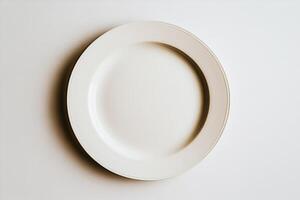 Empty plate on a neutral background showcasing simplicity and design photo