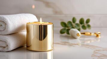 Elegant candle and soft towels create a serene atmosphere in a luxurious bathroom setting. Luxury wellness scene with warm candle flickers beside neatly folded towels, stylish bathroom photo