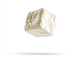 Floating white cube in bright background represents simplicity photo
