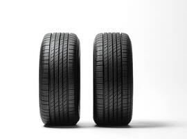 Comparison of two black tires on white background for analysis photo