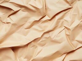 Textured crumpled brown paper sheet with natural light shadows photo