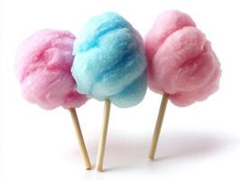 Colorful cotton candy displayed on sticks at a fair photo