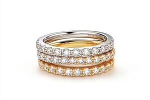 Elegant stacked rings with sparkling gemstones in gold and silver photo