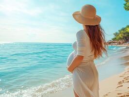 Expecting mother enjoying a beach day at sunset photo