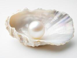 Beautiful pearl resting in a shimmering shell on a white surface photo