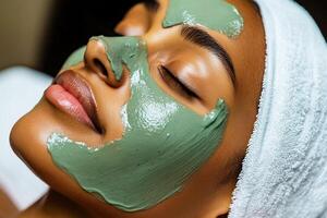 Relaxing facial treatment with green mask in a serene environment photo