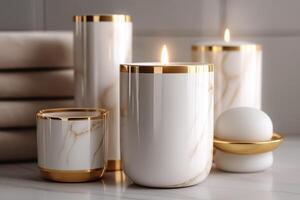 Elegant candle arrangement with gold accents in a serene indoor setting. Soft, warm light emanates from beautifully designed candles featuring marble patterns and gold trim. Luxury wellness scene photo