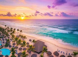 Breathtaking sunset over tranquil beach with palm trees photo