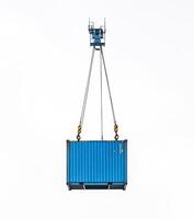 Container being lifted by crane in construction area photo