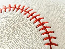Close-up view of a baseball showing detailed stitching and texture photo