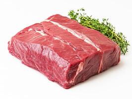 Fresh beef cut with herbs ready for cooking or grilling photo
