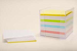 A paper block in the office. Writing pad with sheets for annotations. photo