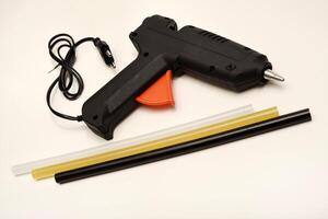 Black glue gun. photo