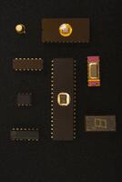 Classic microprocessors on foam padding. Several microchips on black foam. Old integrated circuits for radio electronics. photo